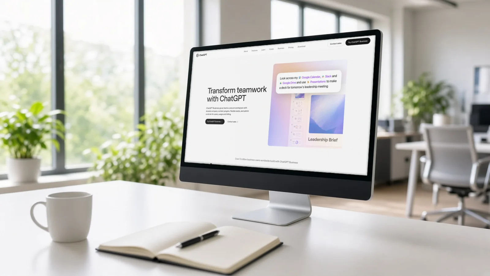Desktop monitor in a bright office showing the official ChatGPT Business page from OpenAI